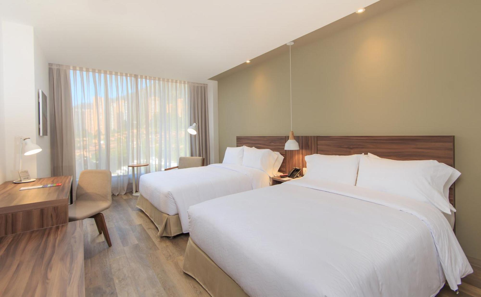 Novotel Medellin El Tesoro Exterior foto A room at the hotel